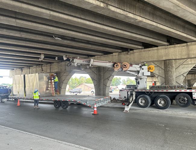 Work under a freeway bridge
